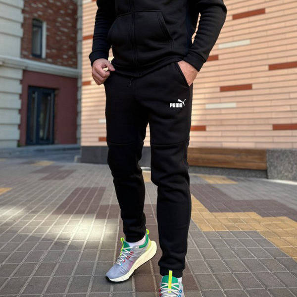 Спортивные штаны Nike мужские зауженные к низу, черные спорт 