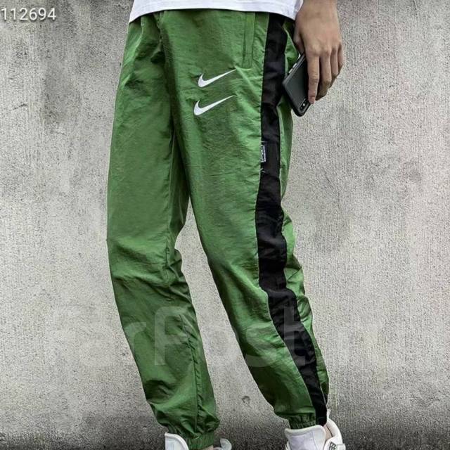 Женские спортивные штаны Nike Windfly Pant 520348 010 